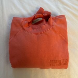Fear of God Essentials, melon colored crew neck.